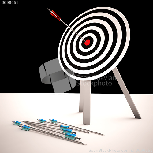 Image of Arrow On Dartboard Shows Centered Shot