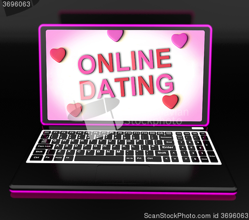 Image of Online Dating Message On Laptop Shows Romancing And Web Love