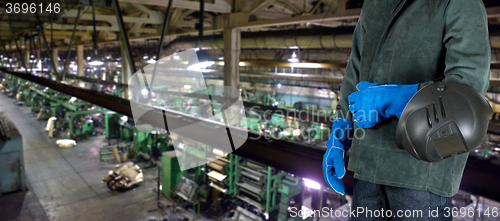 Image of Worker welder at factory