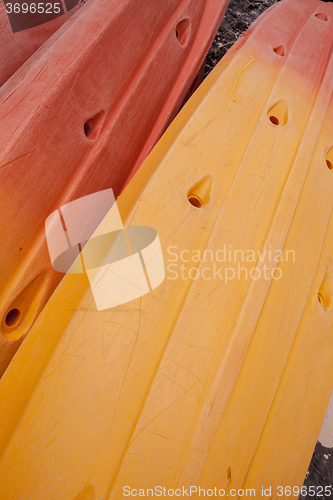 Image of Colorful kayaks on beach in Thailand