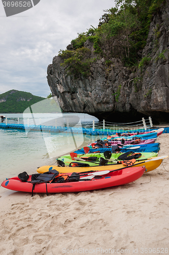 Image of Colorful kayaks on beach in Thailand