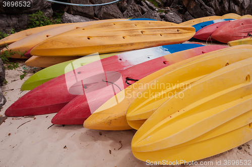 Image of Colorful kayaks on beach in Thailand