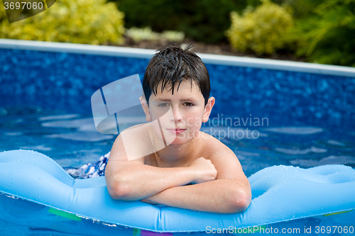 Image of Boy in swimming pool