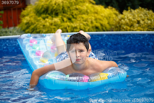 Image of Boy in swimming pool