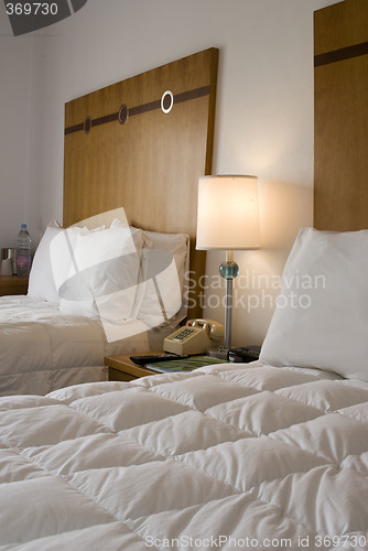 Image of hotel room with down comforter south beach florida