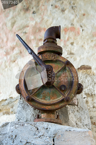 Image of the authentic old rusty faucet 