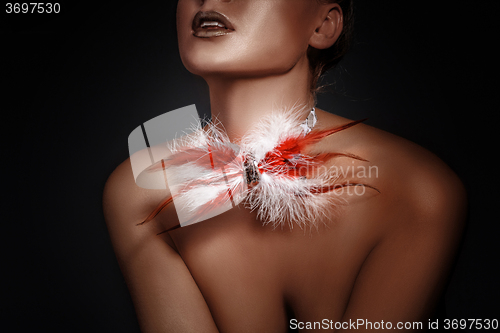 Image of Beautiful woman with a bow tie