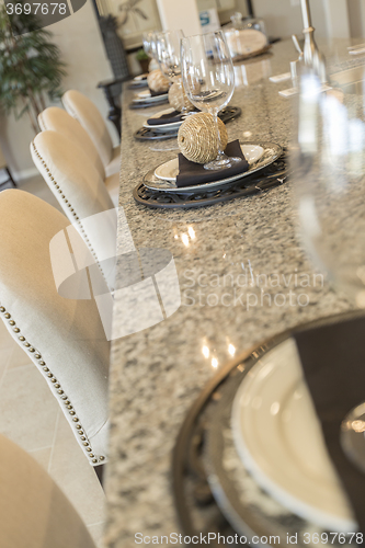 Image of Abstract of Kitchen Counter Place Settings and Chairs