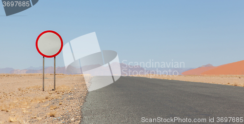 Image of Speed limit sign at a desert road