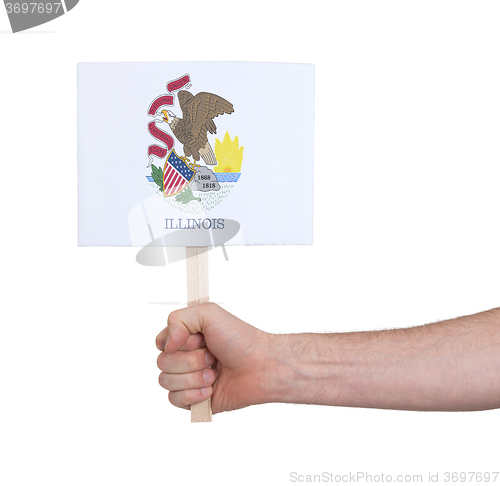 Image of Hand holding small card - Flag of Illinois