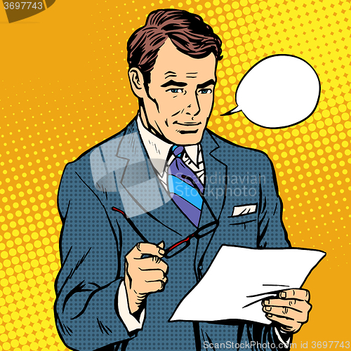 Image of businessman reading a document
