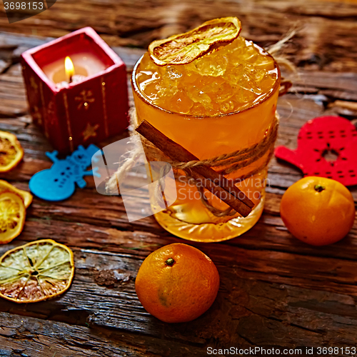 Image of Fresh juice of ripe mandarins in glass.