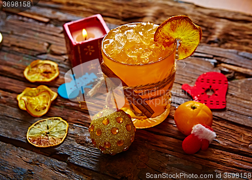 Image of Fresh juice of ripe mandarins in glass.