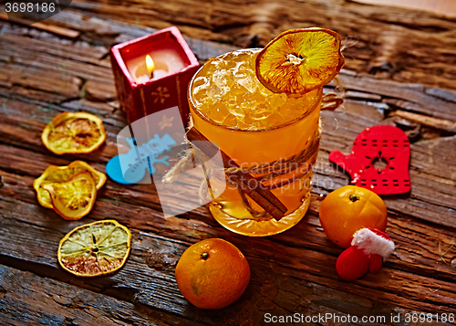 Image of Fresh juice of ripe mandarins in glass.