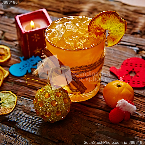 Image of Fresh juice of ripe mandarins in glass.