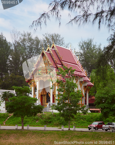 Image of Thai temple amoungst trees 