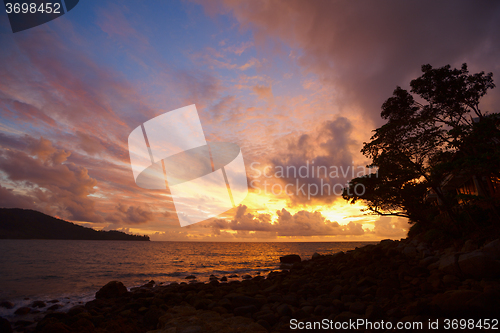 Image of Beautiful tranquil sun rise on the coastline