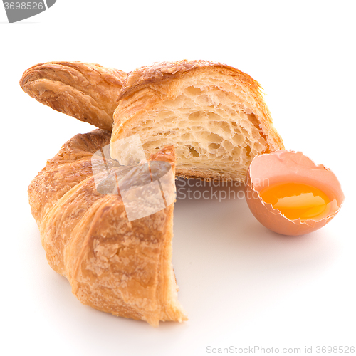 Image of Croissant and raw egg