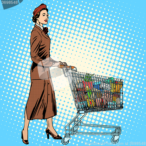 Image of shopper grocery cart full of food