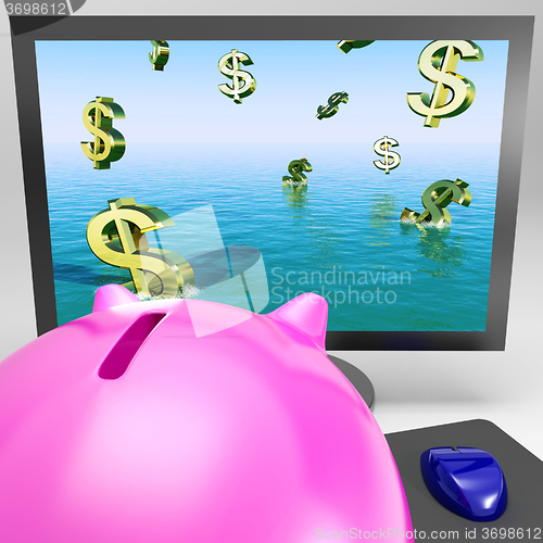 Image of Dollar Symbols Drowning On Monitor Showing Financial Disaster