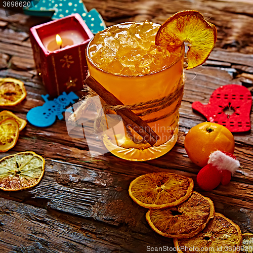 Image of Fresh juice of ripe mandarins in glass.