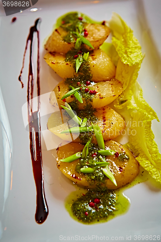 Image of appetizer of grilled celery with greens 