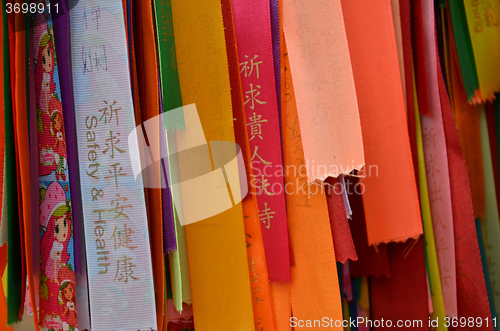 Image of Blessing ribbons hang outside in Kek Lok Si, Penang