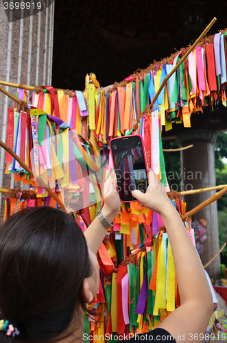 Image of Blessing ribbons hang outside in Kek Lok Si, Penang