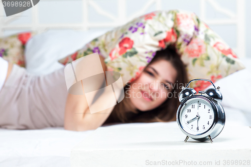 Image of The young girl in bed