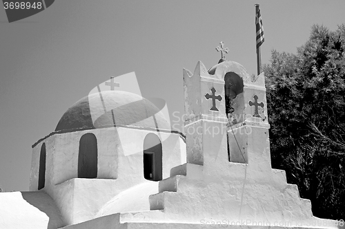 Image of in cyclades      europe greece a cross the cloudy sky and bell