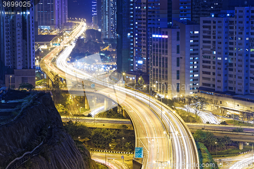 Image of busy traffic night in finance urban