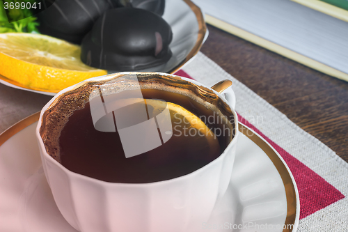 Image of Still life : a Cup of black coffee on the table.