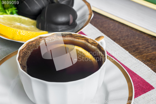 Image of Still life : a Cup of black coffee on the table.