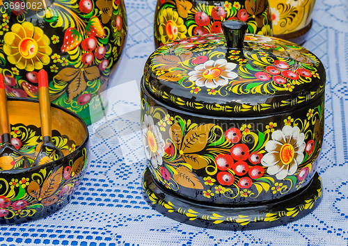 Image of Decorated with beautiful paintings, utensils made of wood.