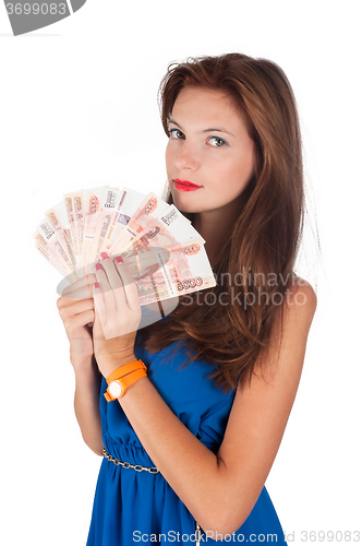 Image of Young pretty woman with freckles holds cash