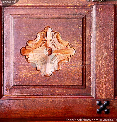Image of spain knocker lanzarote  door wood in the red brown 