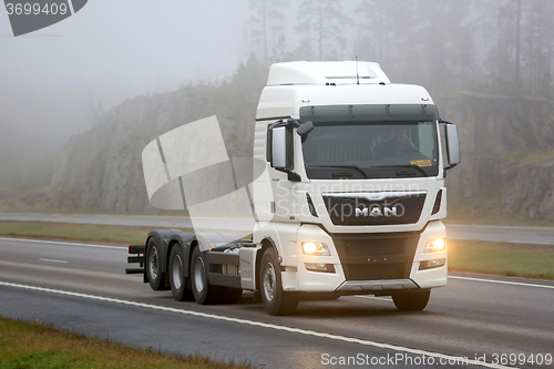 Image of White MAN TGX 35.360 D38 Truck on Motorway