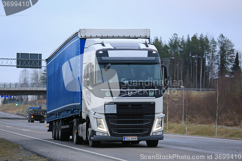 Image of Volvo FH Semi Moving along Highway