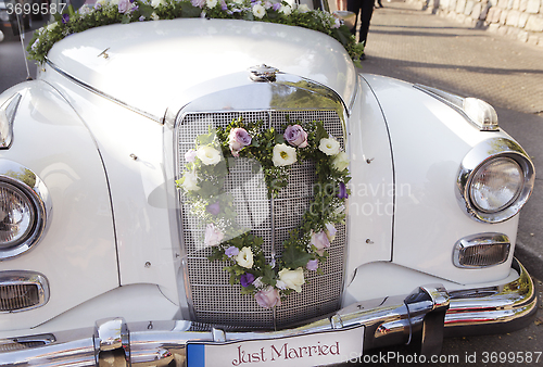 Image of decorated wedding car