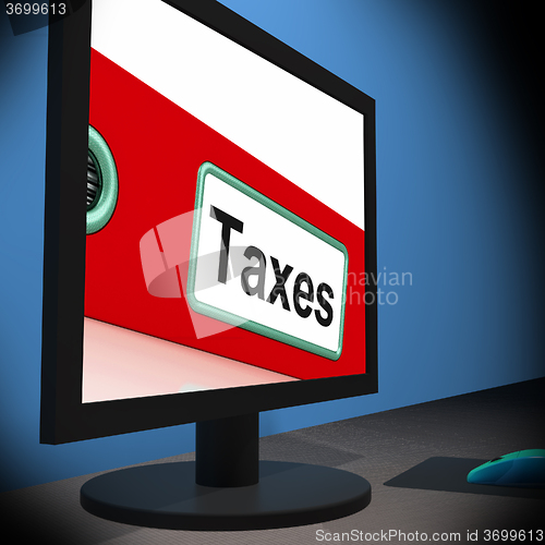 Image of Taxes On Monitor Showing Taxation