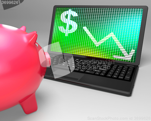 Image of Dollar Symbol On Laptop Shows American Monetary Risks