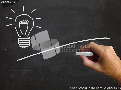 Image of Light Bulb And Blackboard Copyspace Shows Ideas And Blank Vision