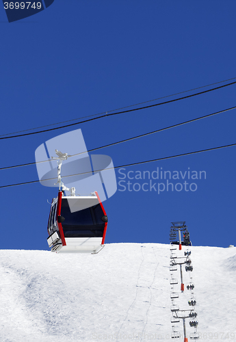 Image of Gondola and chair-lifts at ski resort in nice day