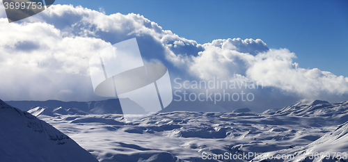 Image of Panoramic view on snow plateau in evening