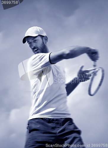 Image of male tennis player in action 