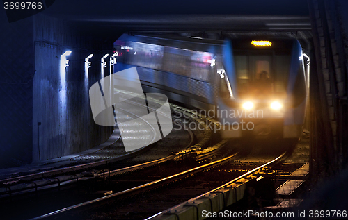 Image of Trains on traintracks, blurred