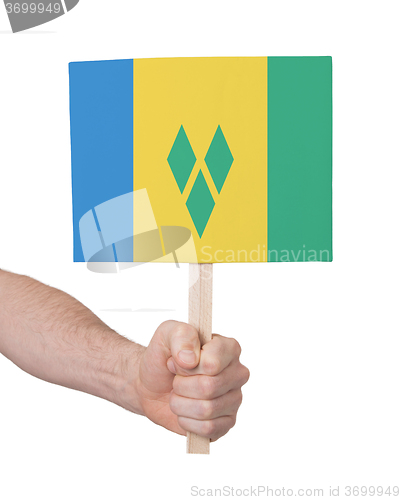 Image of Hand holding small card - Flag of Saint Vincent and the Grenadin