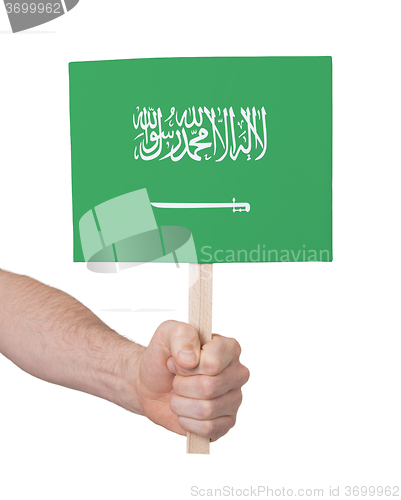 Image of Hand holding small card - Flag of Saudi Arabia