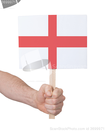 Image of Hand holding small card - Flag of England