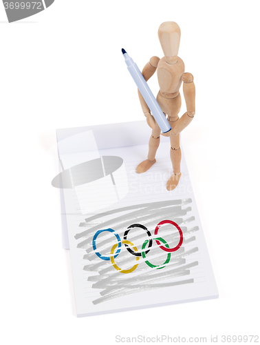 Image of Wooden mannequin made a drawing - Olympic Rings